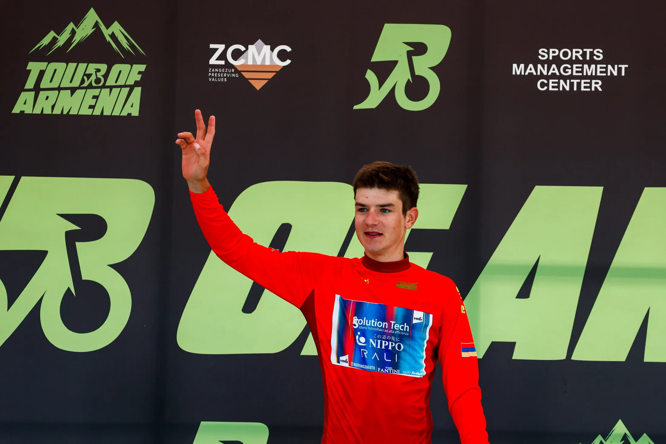 The race leader’s red jersey on the podium