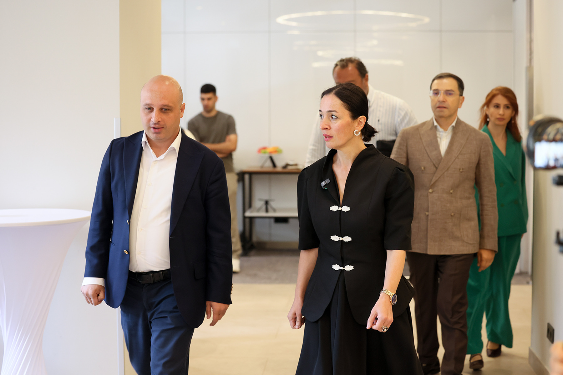 The delegation arrives for the press conference